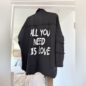 Elan Black Frayed Utility Jacket with White Text.